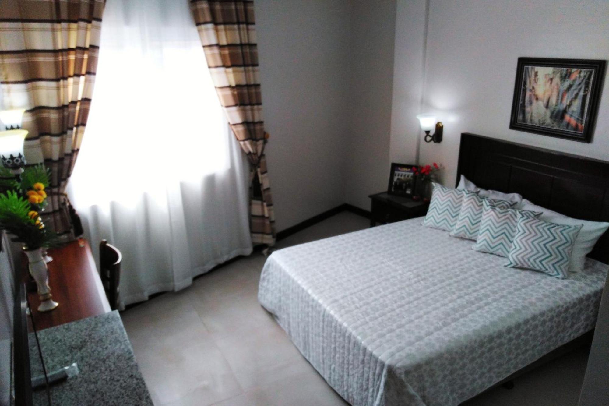Venezia Suites Hotel Iloilo Chambre photo